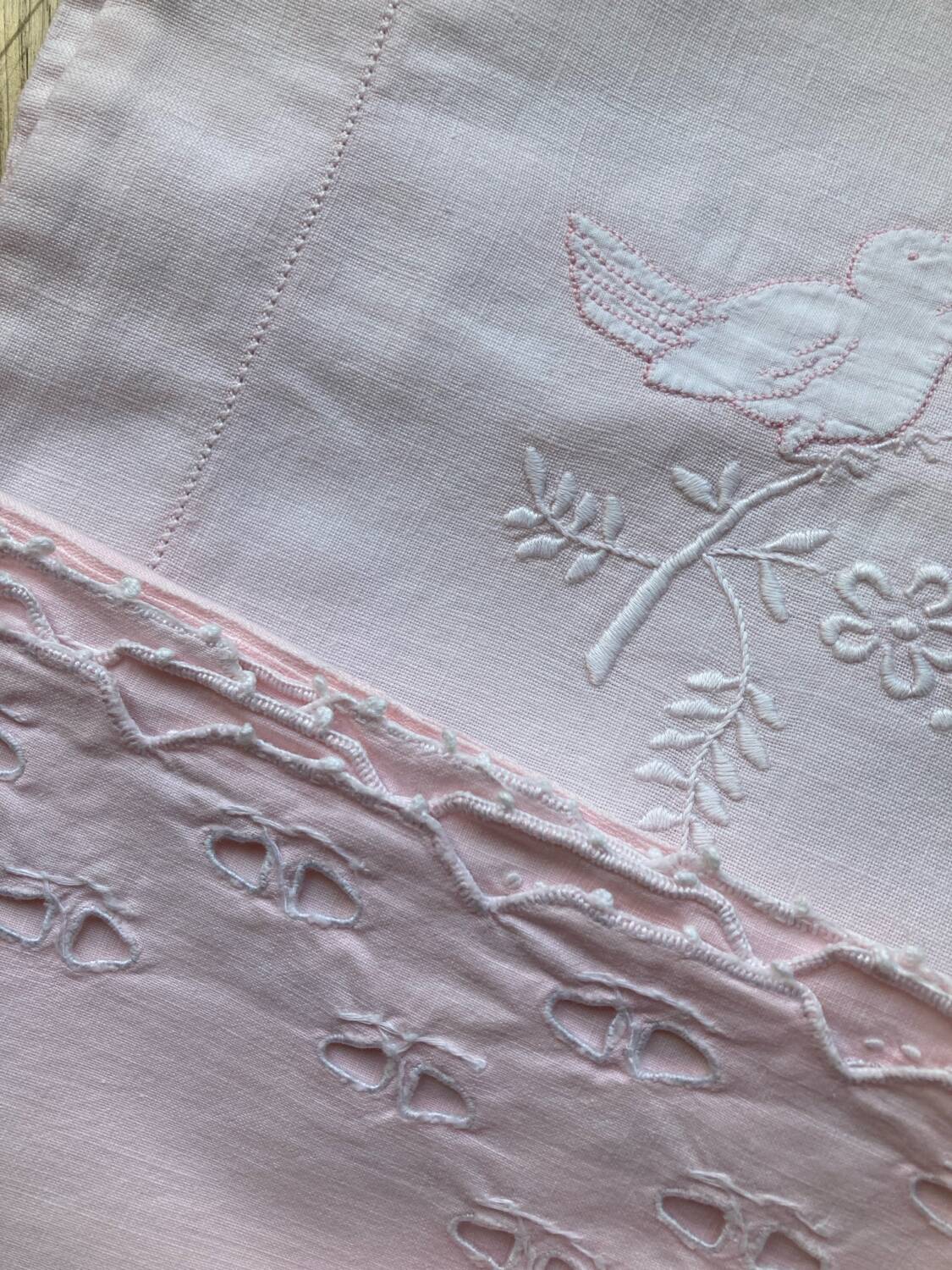 Set of embroidered baby bed sheets