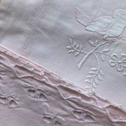 Set of embroidered baby bed sheets