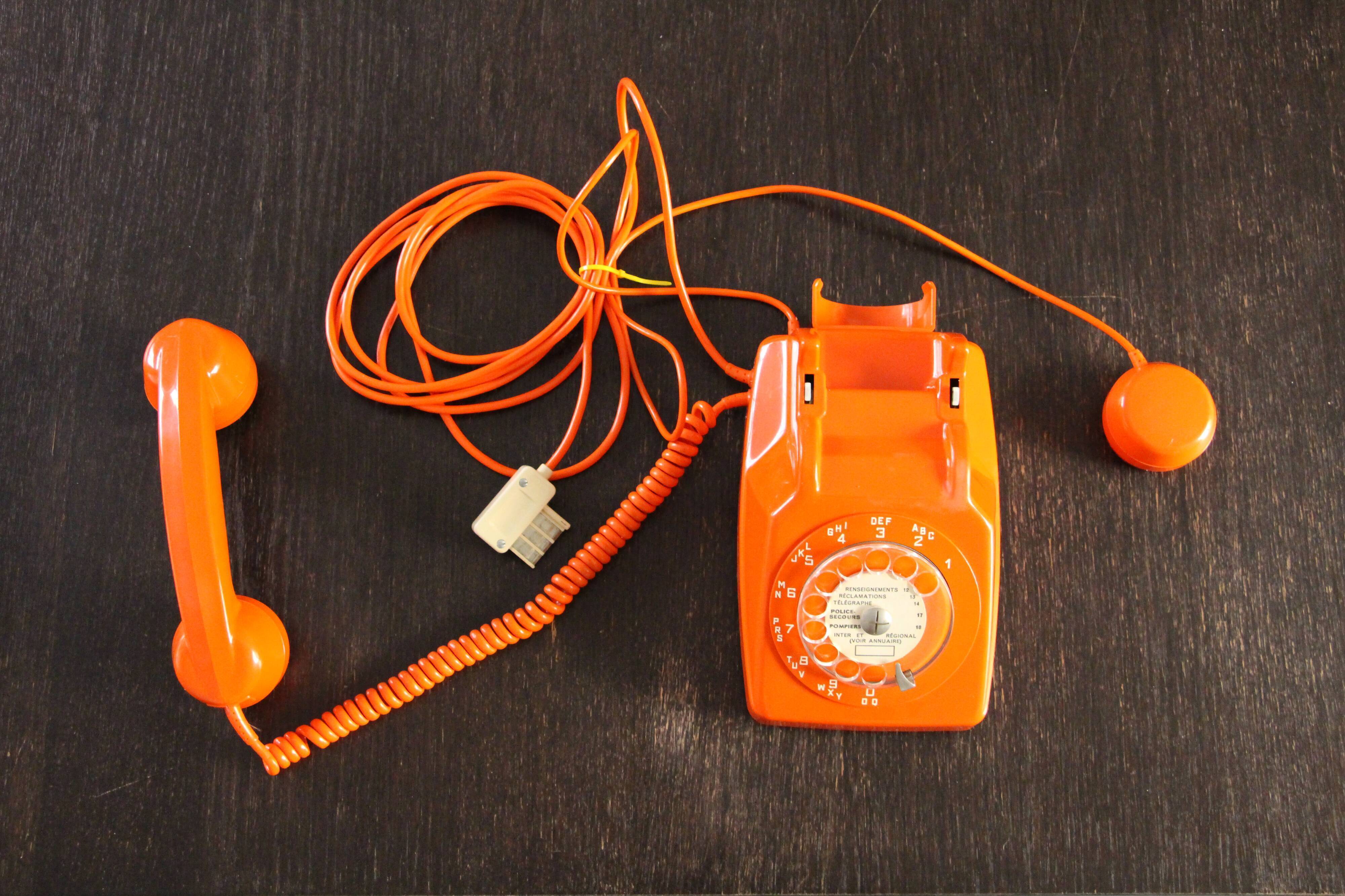 Vintage phone with orange dial 70's