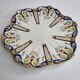Old dish in polychrome earthenware from Desvres decorated from Rouen, signed, 34 cm