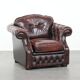 Fauteuil Chesterfield en cuir marbré rouge de style anglais