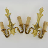 Old pair of wall sconces with double fires in bronze, seventies