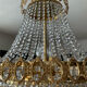 Lustre cascade en bronze et pampilles de cristal