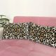 Ikat cushion in panther velvet