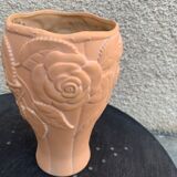 Terracotta vase with a vintage ceramic relief rose pattern