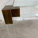 Lucite and brass coffee table by Charles Hollis Jones