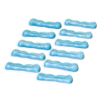 Antique Art Deco knife rest in turquoise earthenware