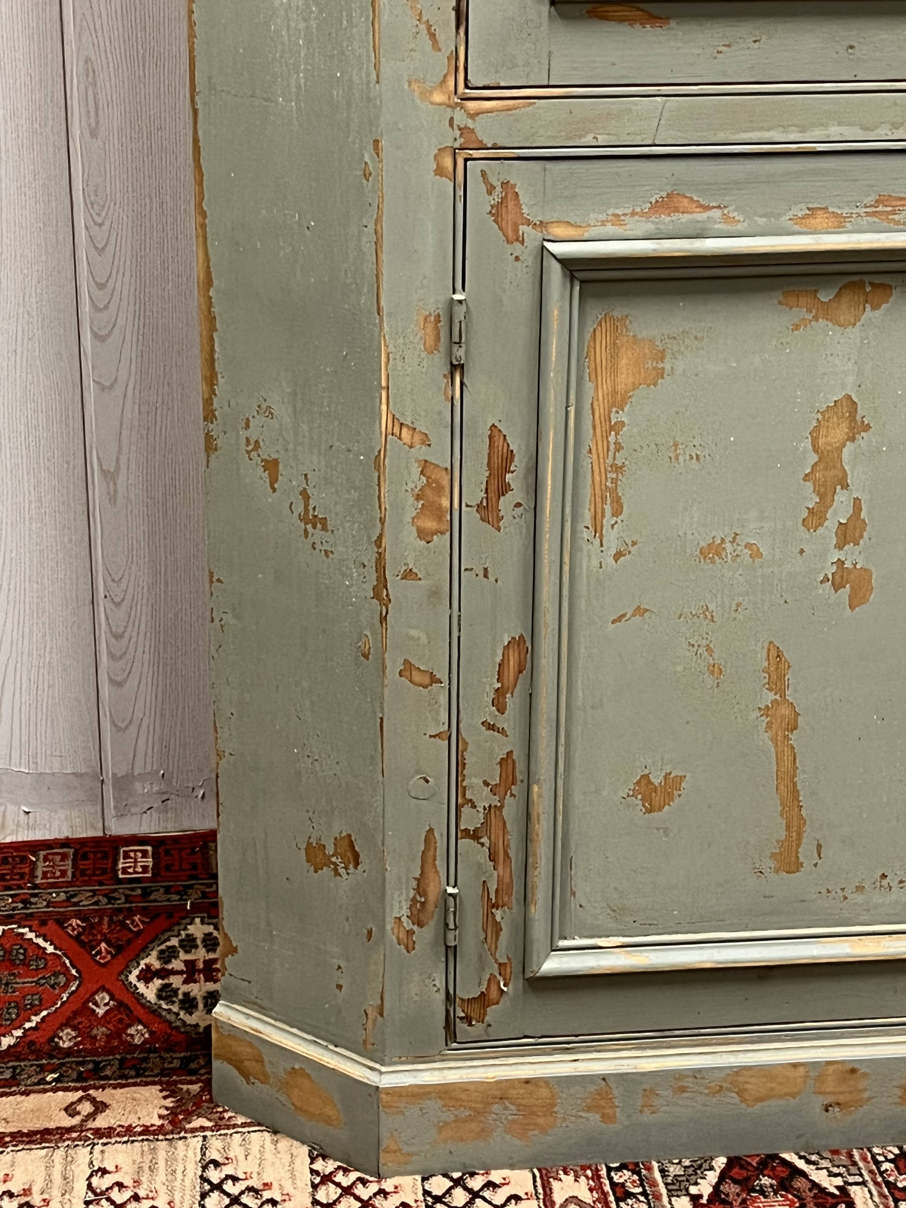 Patinated corner cupboard