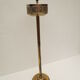 Old ashtray on foot year 50 in gilded brass