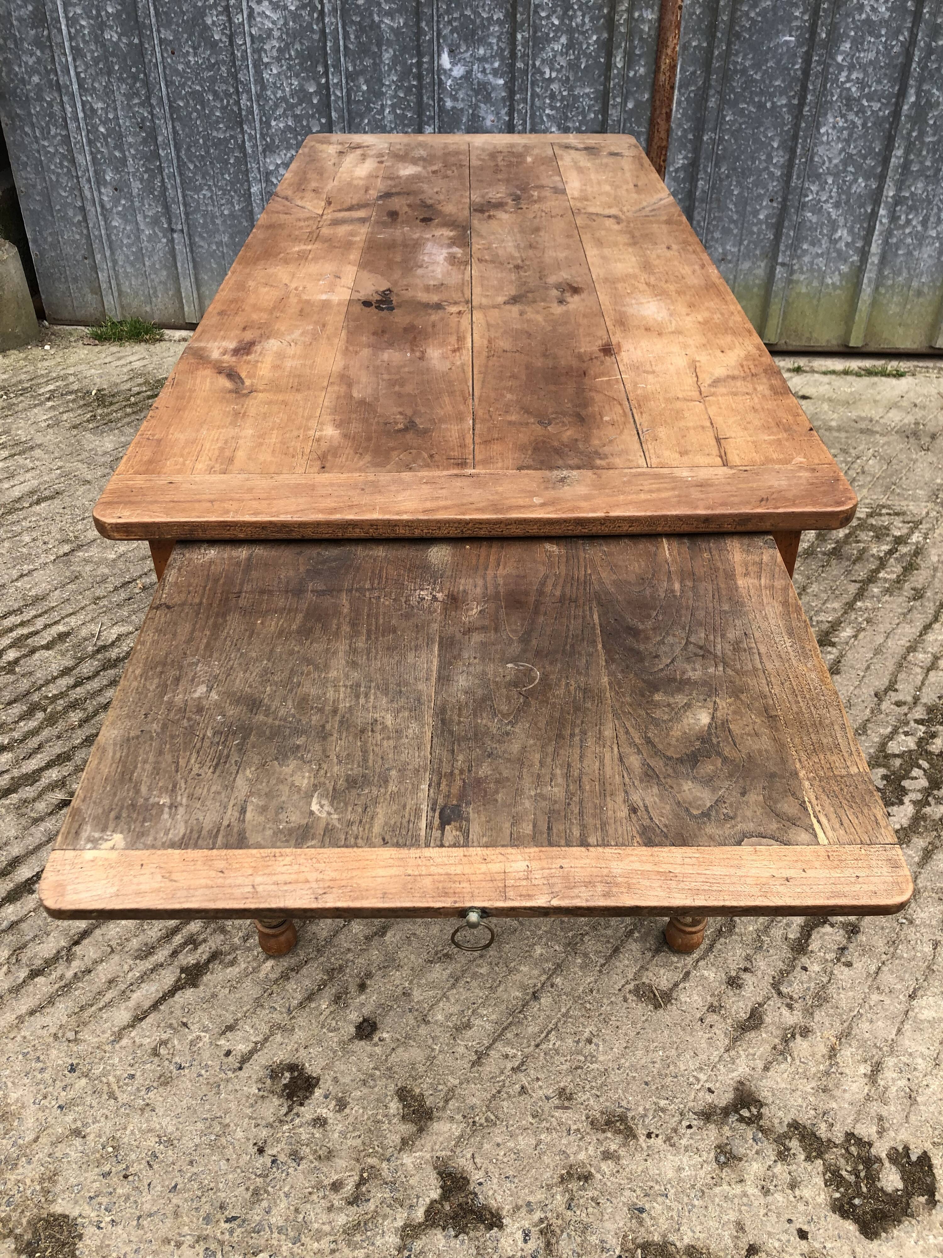 Antique cherry farmhouse table with 2 drawers and 1 pull-out