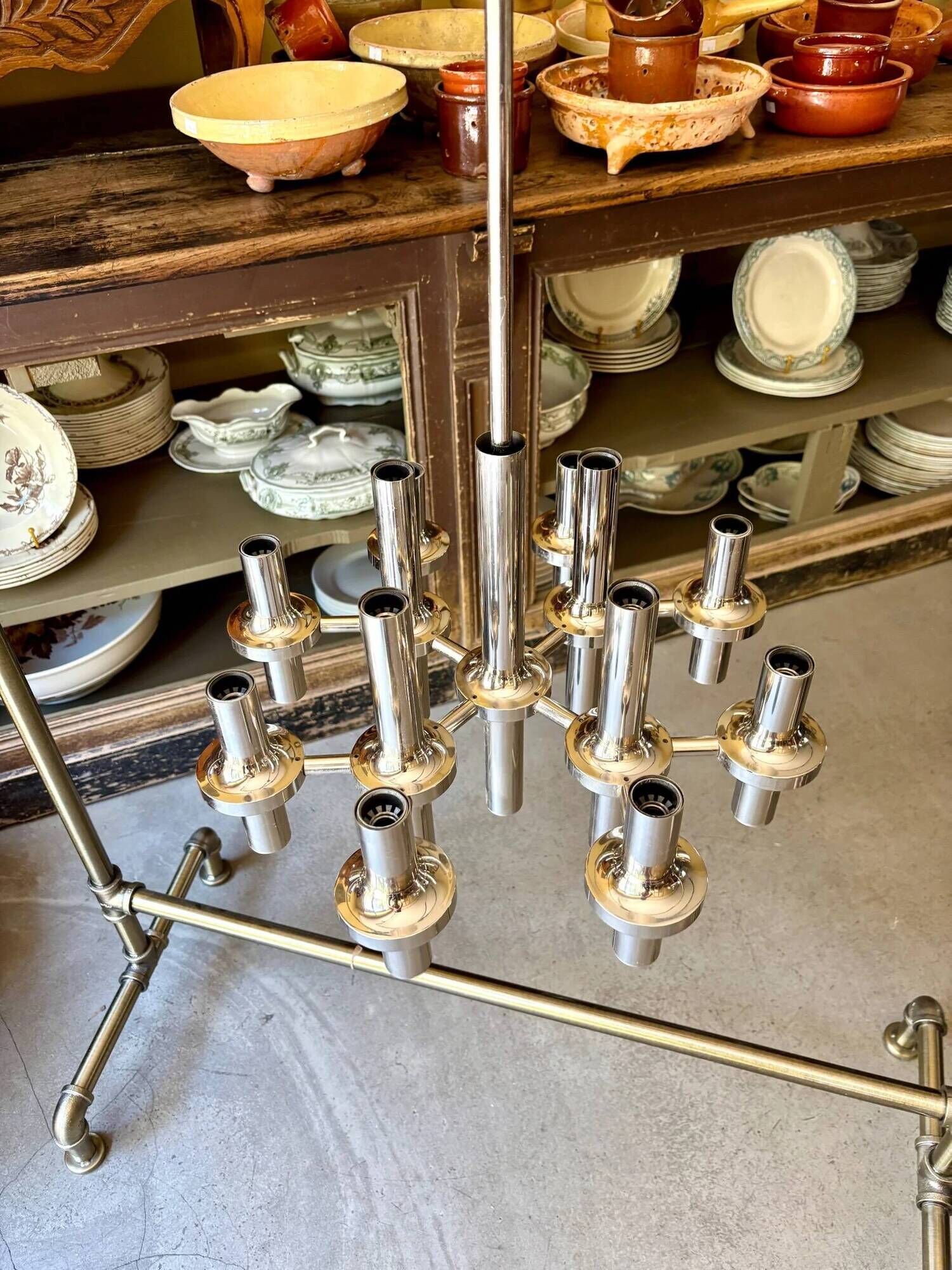 Chandelier with 12 lights in chrome metal attributed to Gaetano Sciolari for Staff Leuchten, 1970.