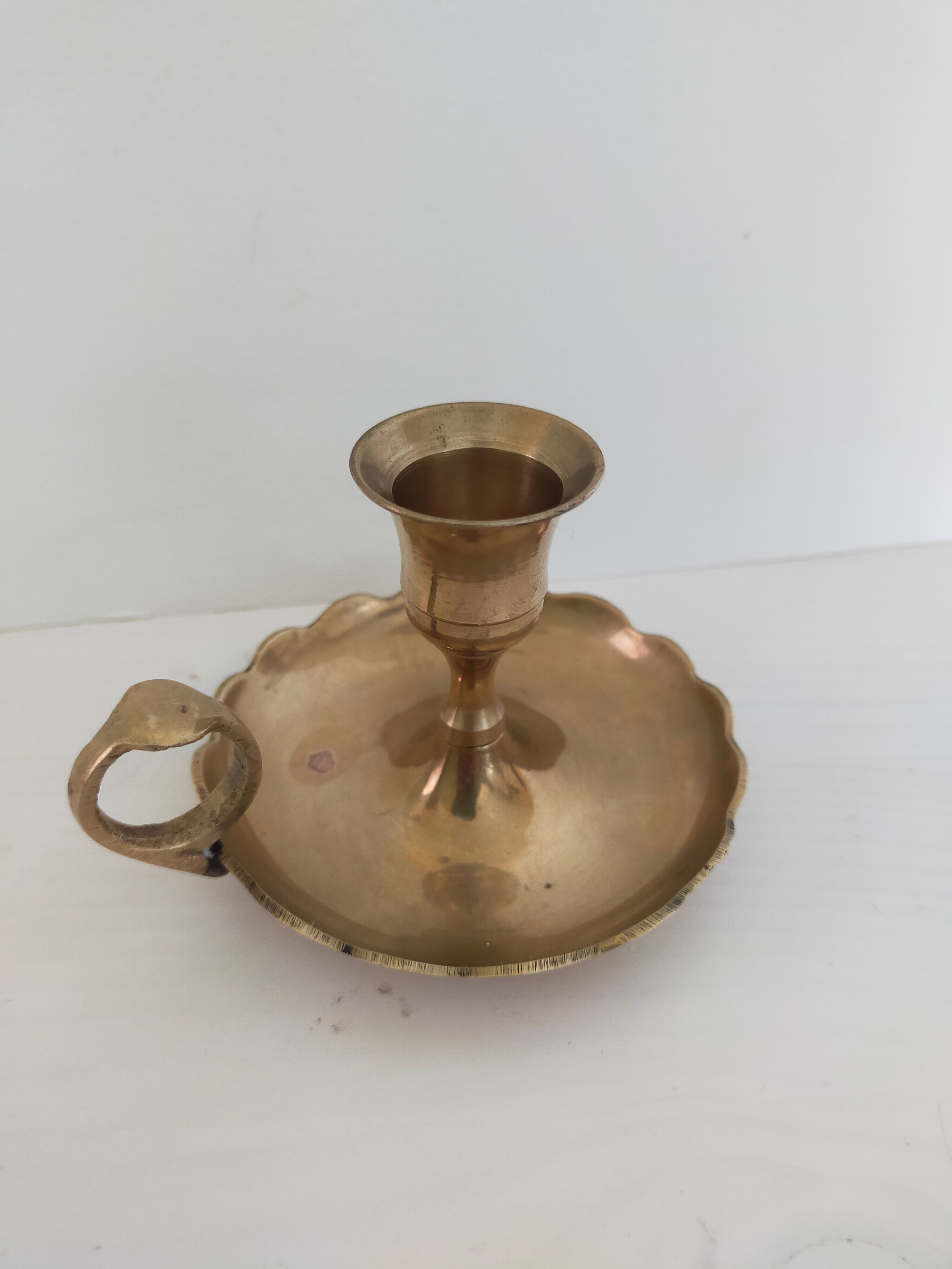 Brass handheld candle holder
