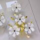 pair of floral wall lights from the 60s-70s