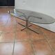 Coffee table with chrome base and smoked glass from the 70s