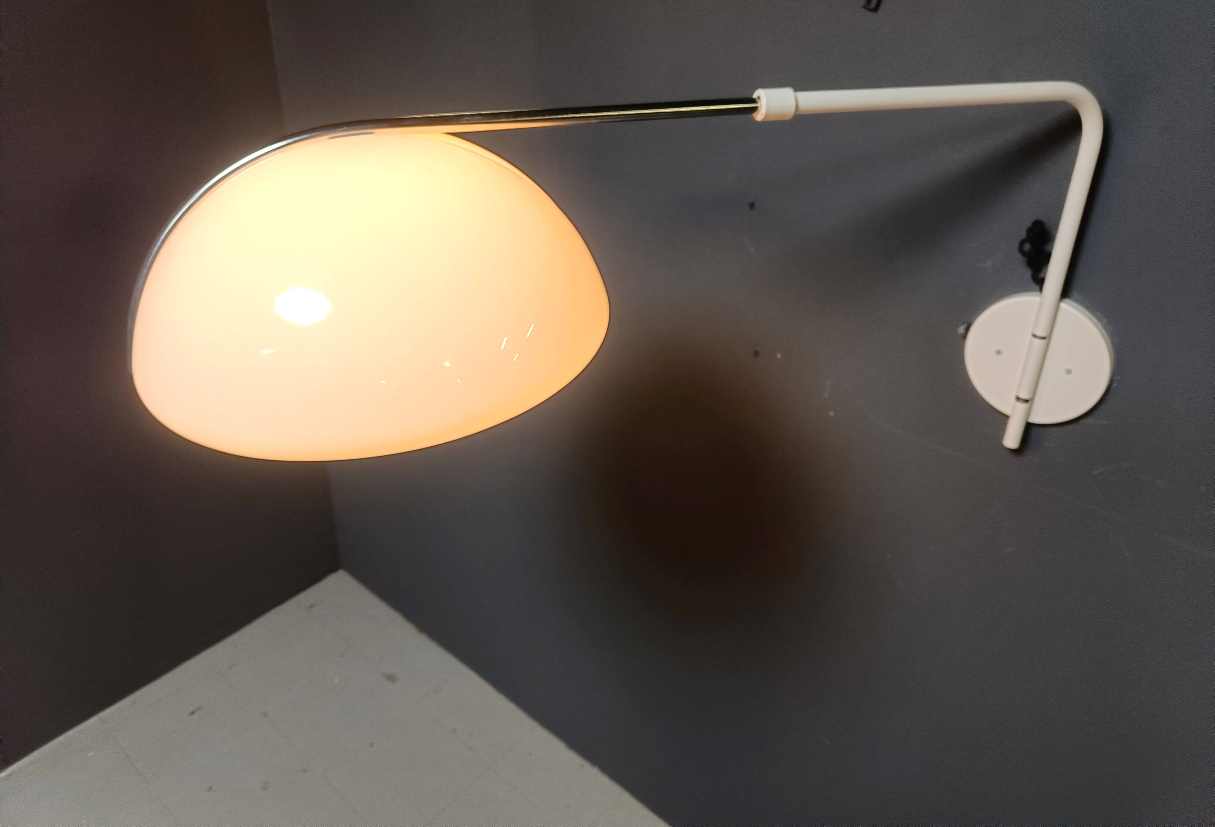 Vintage wall lamp by Luigi Massoni for Guzzini, 1970s