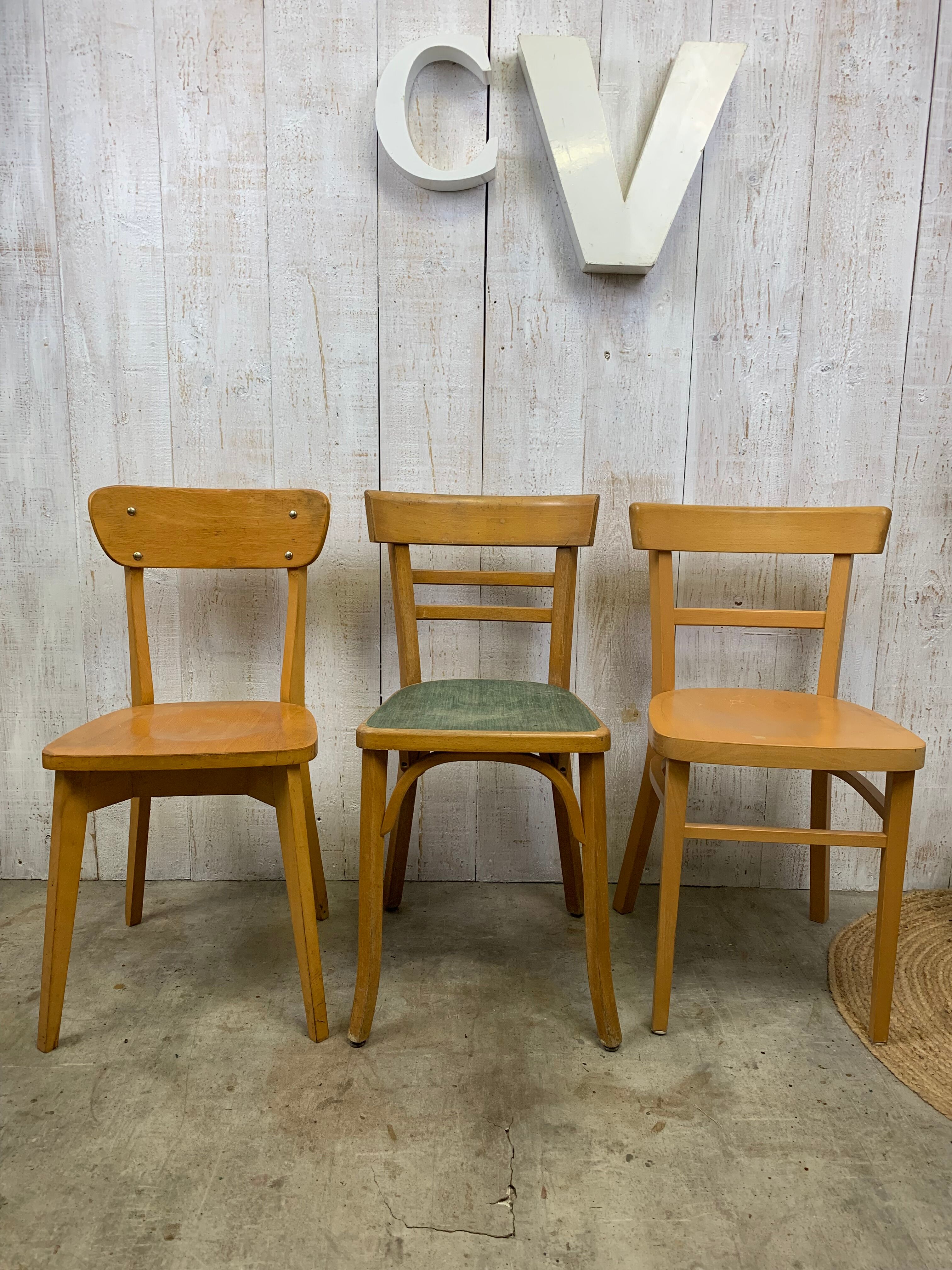 Lot 3 mismatched bistro chairs