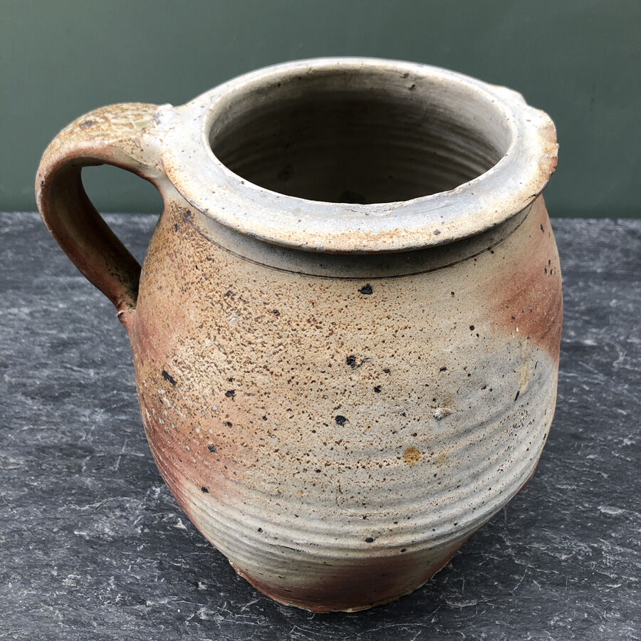 Old pot in glazed sandstone
