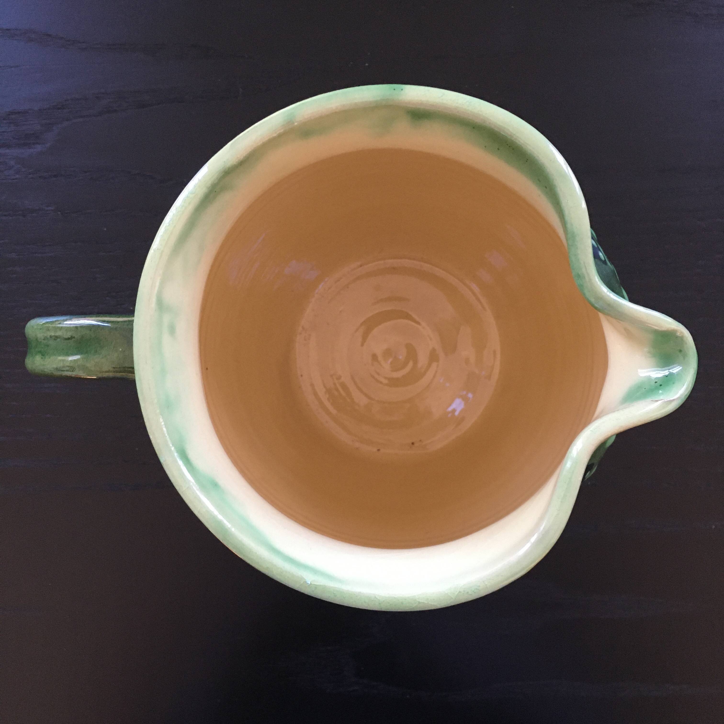 Large pitcher with floral decoration