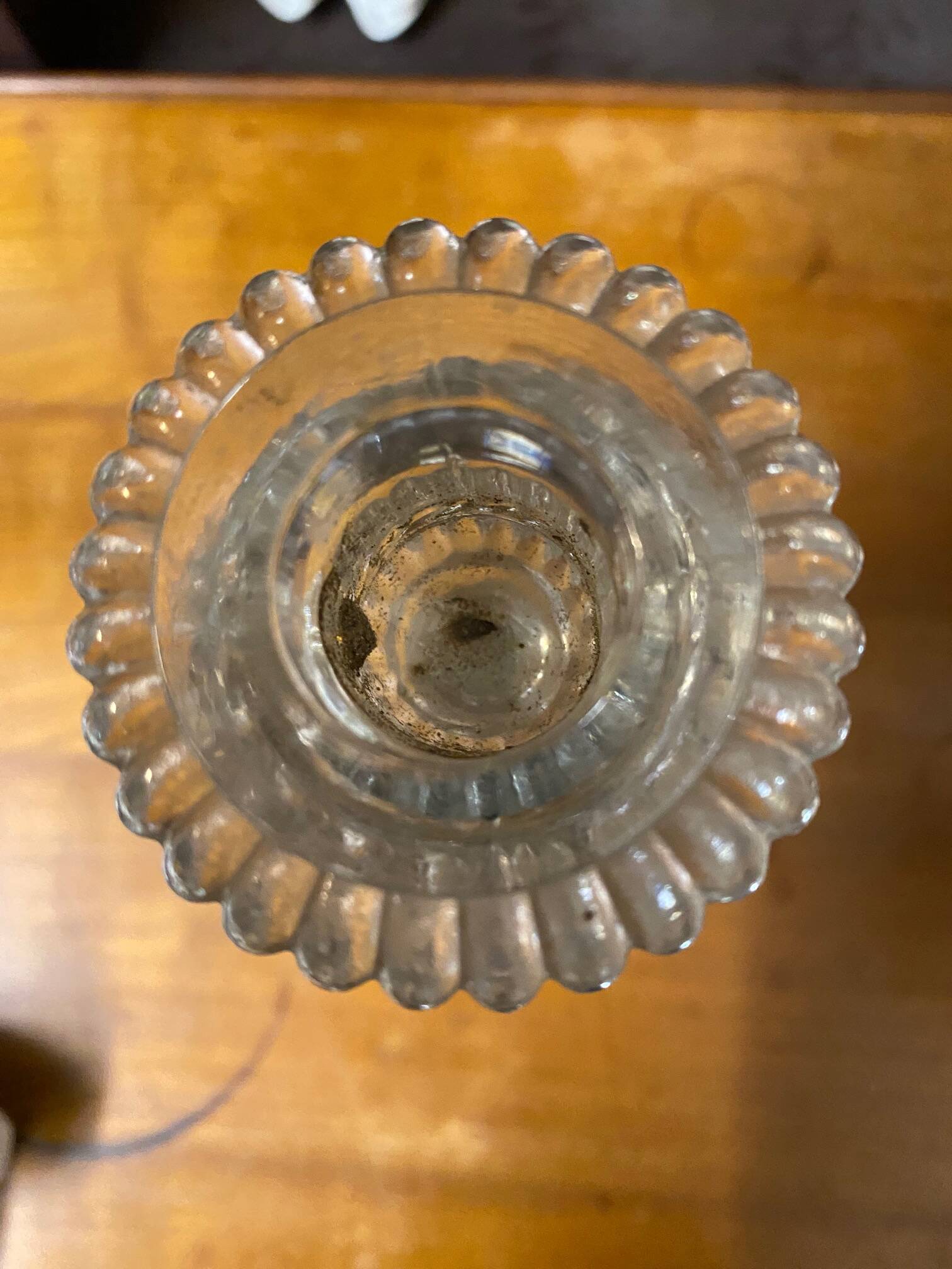 pair of cut glass candlesticks with lion and ram head decor, late 19th century