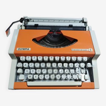 Olympia traveler luxury orange typewriter overhauled and new ribbon