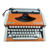 Machine à écrire Olympia traveller de luxe orange révisé et ruban neuf