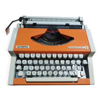 Olympia traveler luxury orange typewriter overhauled and new ribbon