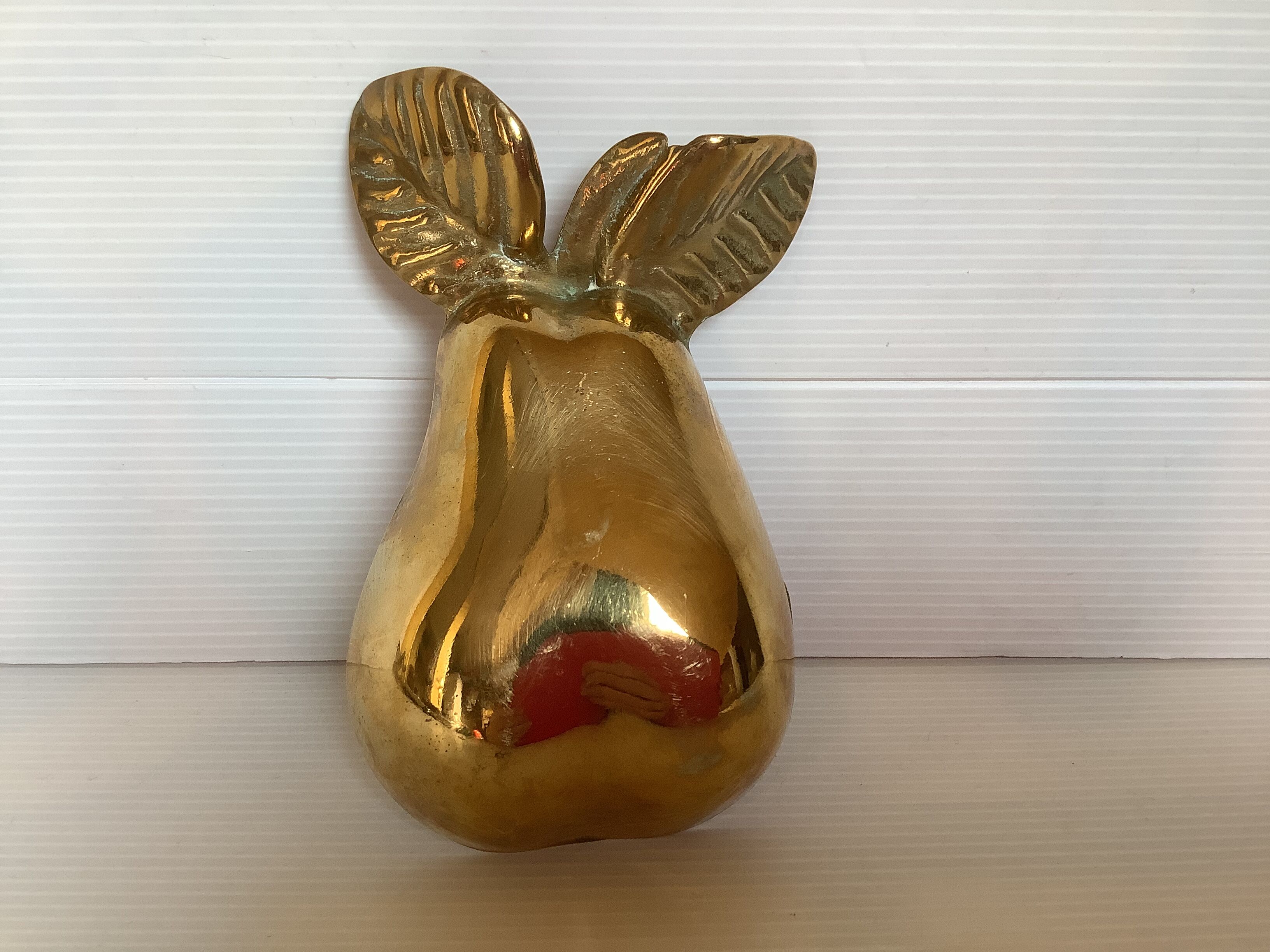 Empty pocket pear fruit brass