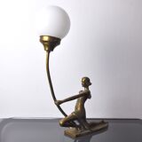 "Woman with the Bow" lamp, Laiton and Opaline, France, midcentury