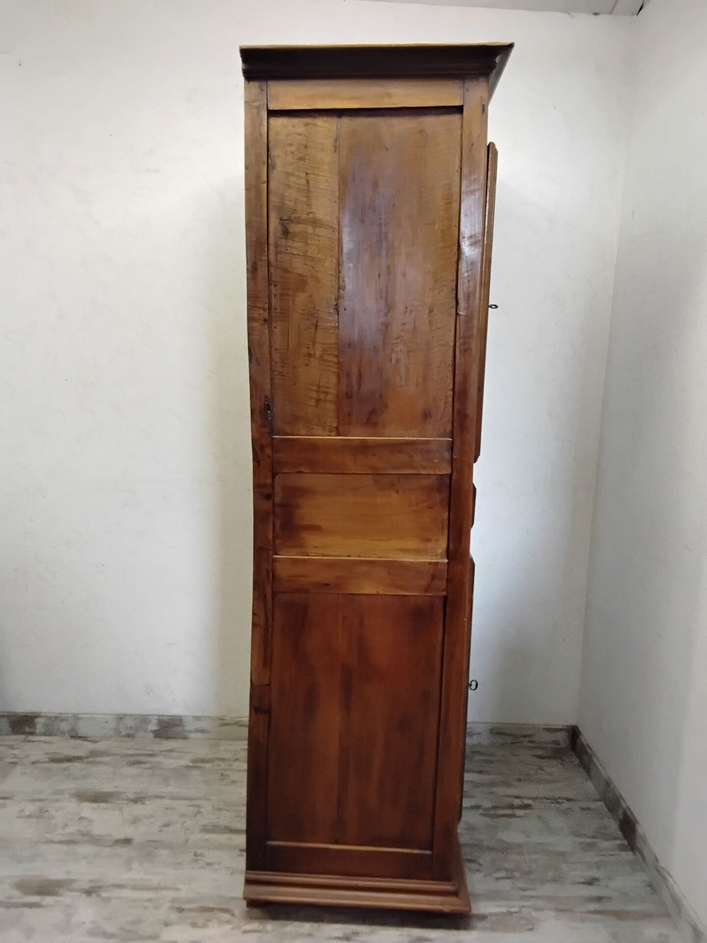 Antique wardrobe standing man