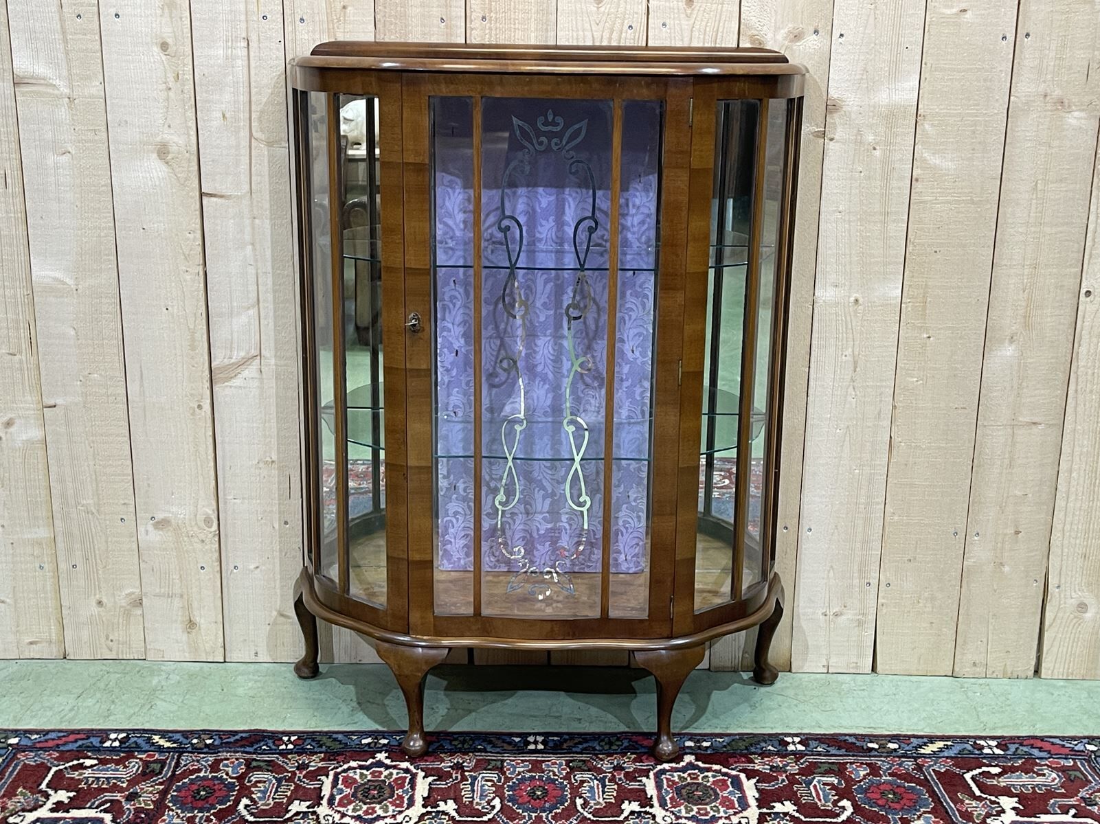 English walnut showcase from the 1930s