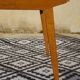 Extendable table, compass legs
