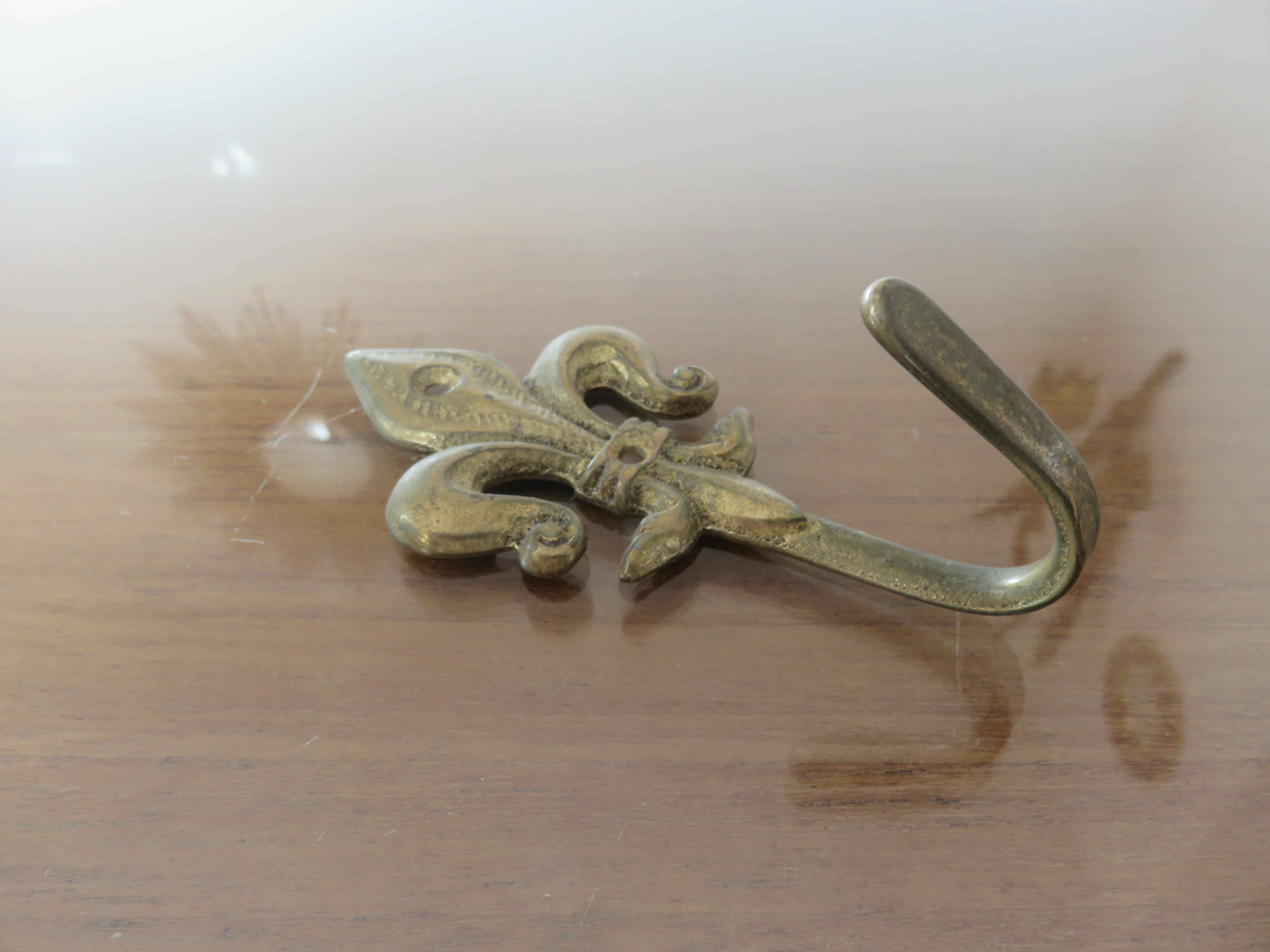 Brass "fleur de lys" hook 30-40s