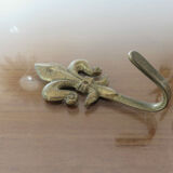 Brass "fleur de lys" hook 30-40s