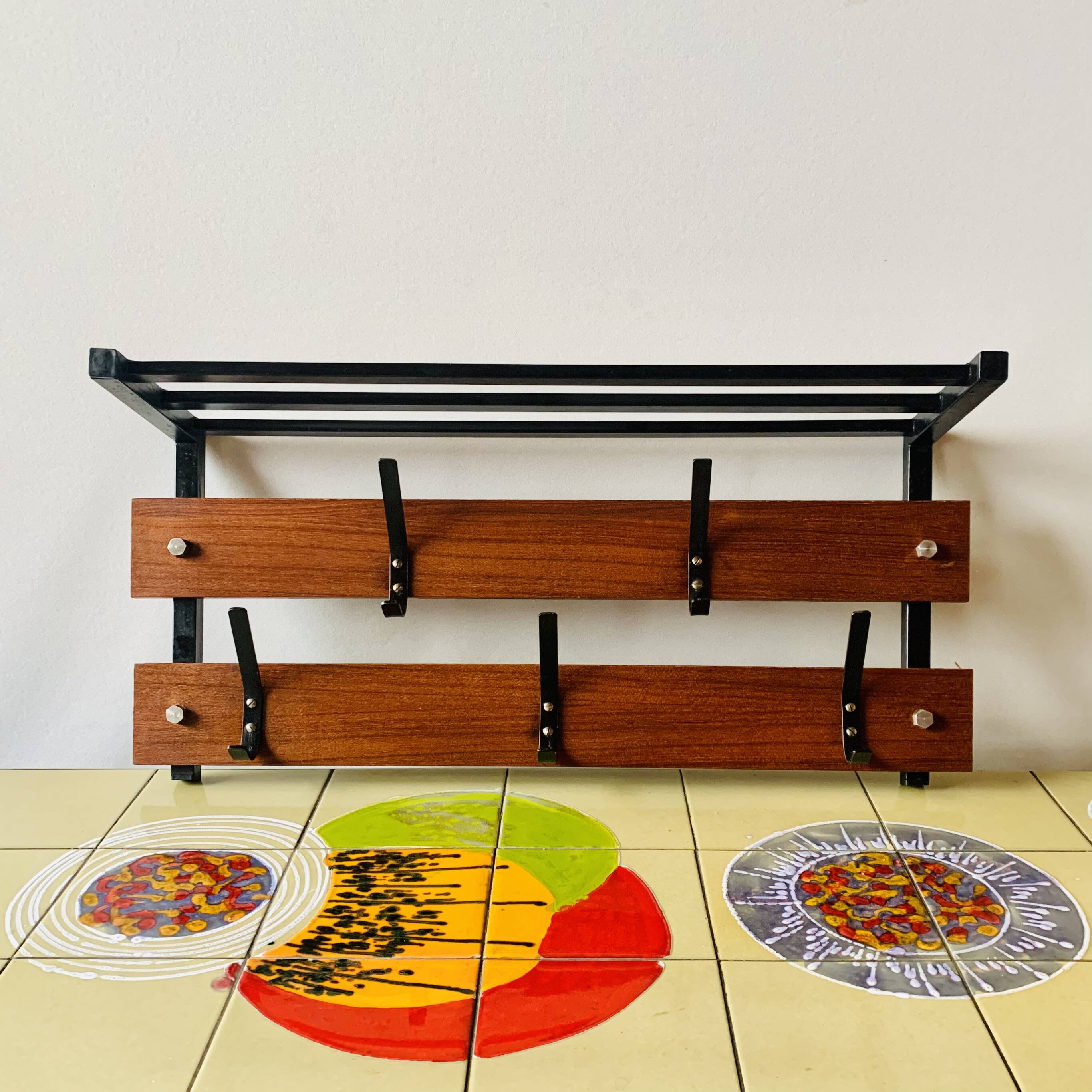 Vintage wall-mounted coat rack in wood and black metal