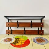 Vintage wall-mounted coat rack in wood and black metal