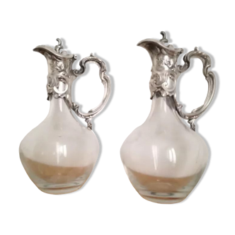 Two Ercuis decanters in crystal and silver plated metal