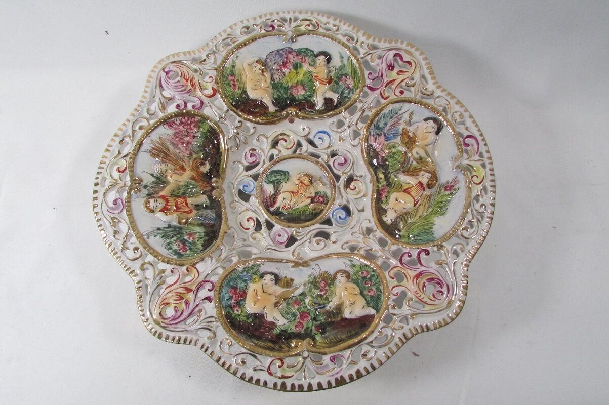 Capedimonté openwork plate, 4 seasons putto