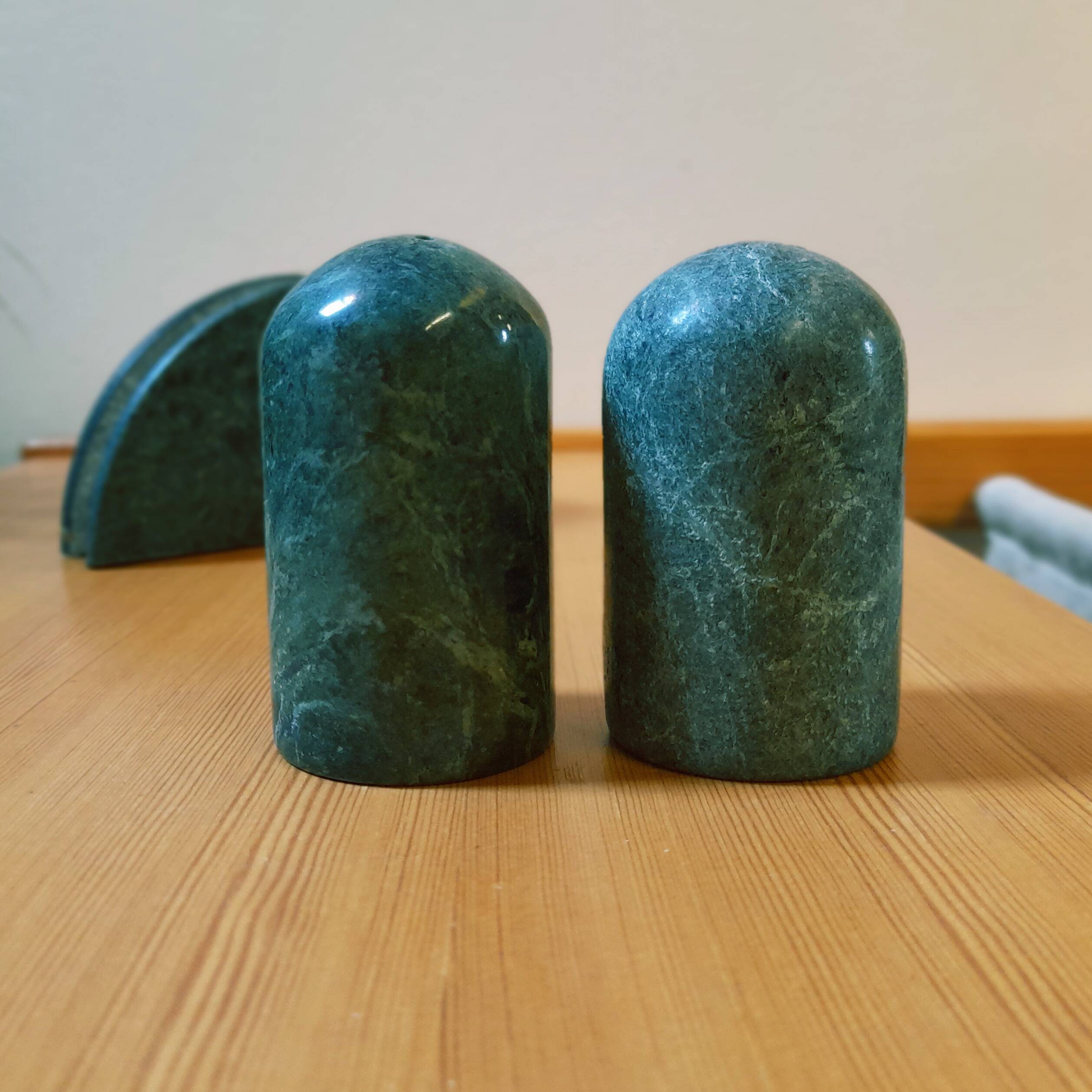 Trio of salt shakers, pepper shakers and napkin holders in green marble