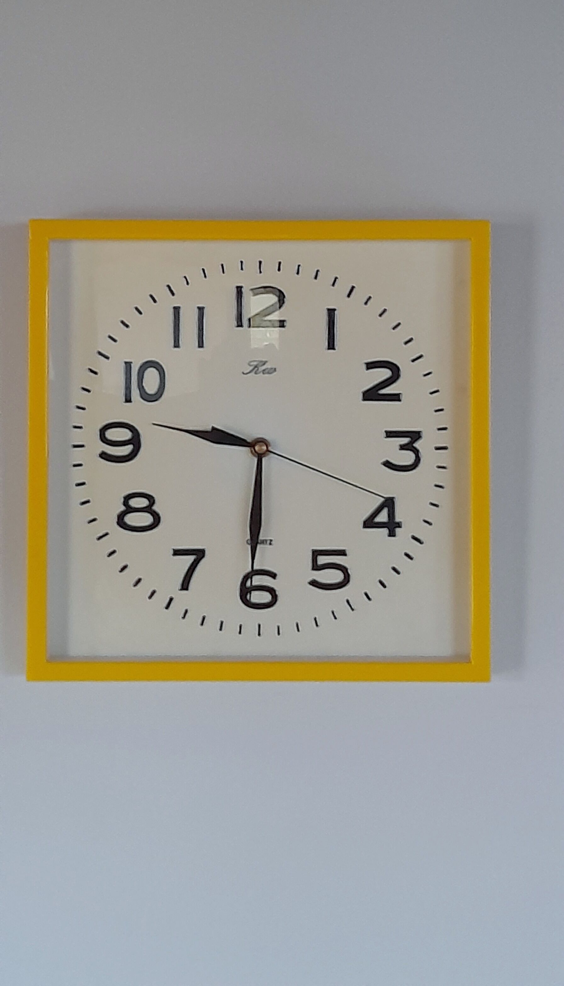 Vintage yellow plastic clock 70s