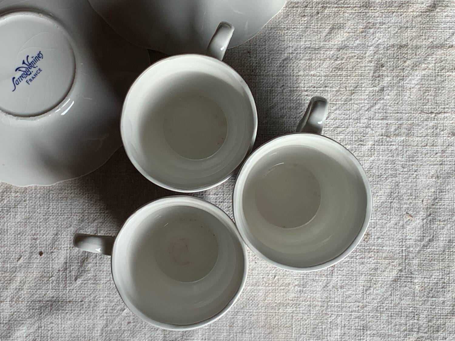 Three antique blue coffee cups from Sarreguemines, France