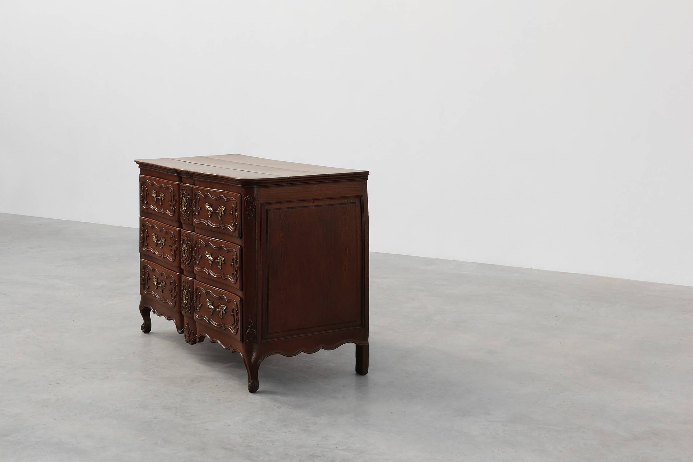 French 18th Century hand crafted oak chest of drawers in Louis XV style