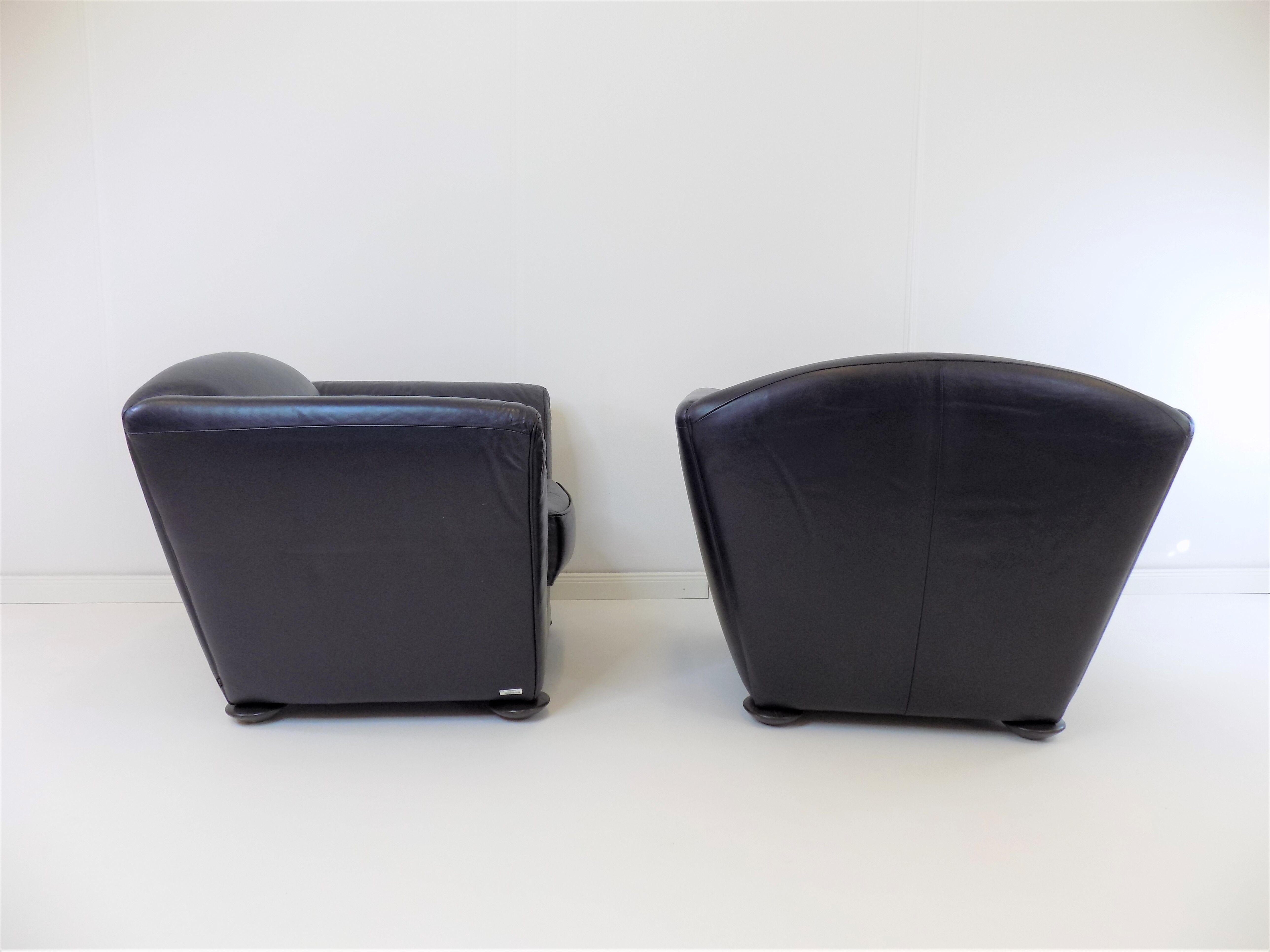 Set de 2 fauteuils en cuir par Peter Maly