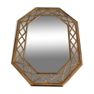 Miroir octogonal en bois doré à pare-closes