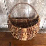 Old grape picker's basket wicker woven vines vintage wine