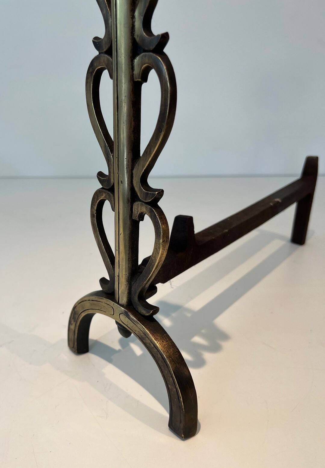 Pair of Brass and Wrought Iron Chenets with Scroll Columns and Arched Bases