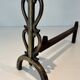 Pair of Brass and Wrought Iron Chenets with Scroll Columns and Arched Bases