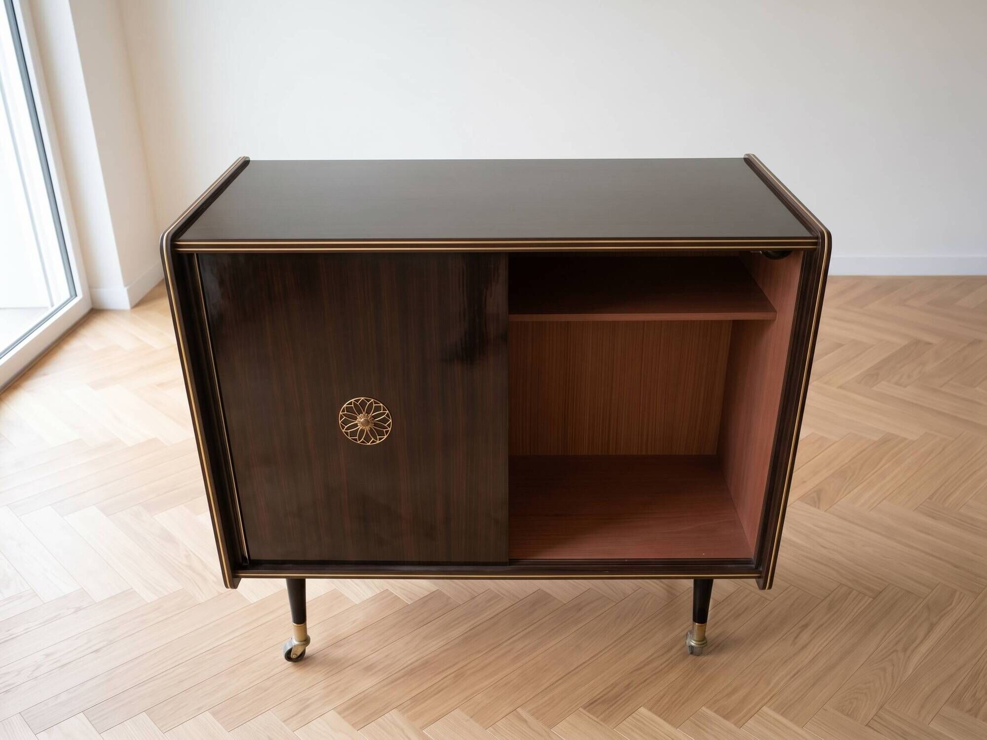 Vintage 1950s TV cabinet in wood with gold details.