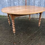 Round table in solid cherry wood, extendable with twisted legs, Louis Philippe style.