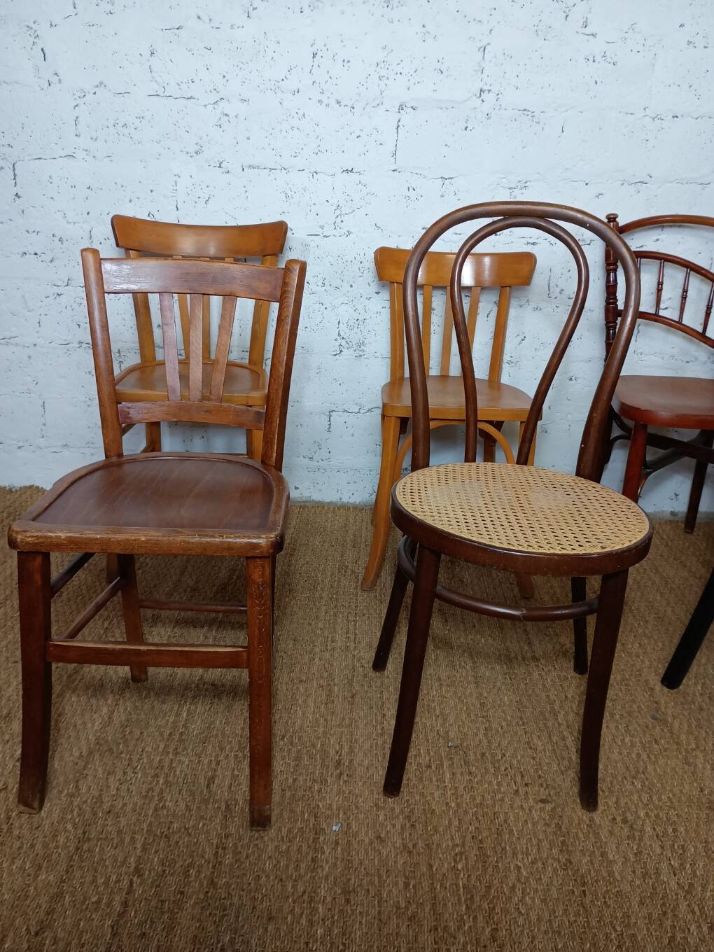 Set of 8 mismatched vintage bistro chairs