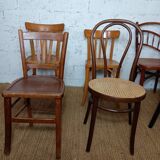 Set of 8 mismatched vintage bistro chairs